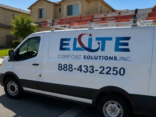 Elite Comfort Solutions service van parked in a residential driveway